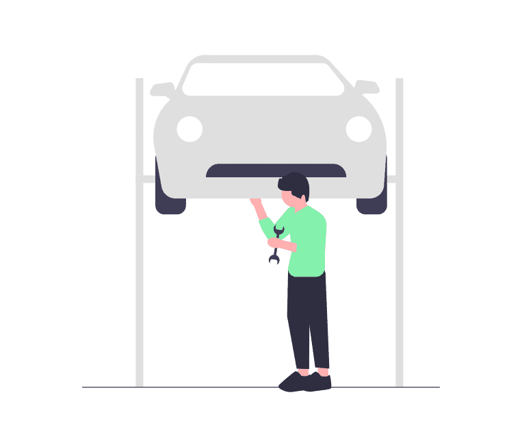 man fixing car during MOT